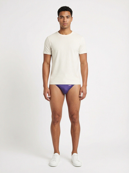 Purple groovin underwear string bikini briefs with subtle logo on waistband in indigo purple color