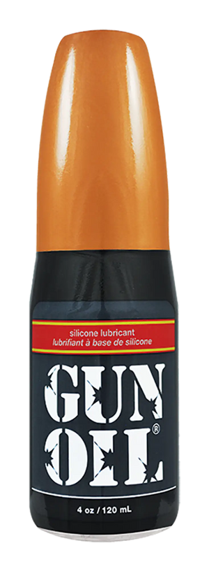 Orange-topped black bottle of gun oil silicone lubricant for firearm maintenance and protection