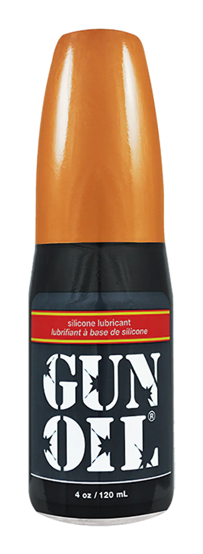 Orange-topped black bottle of gun oil silicone lubricant for firearm maintenance and protection