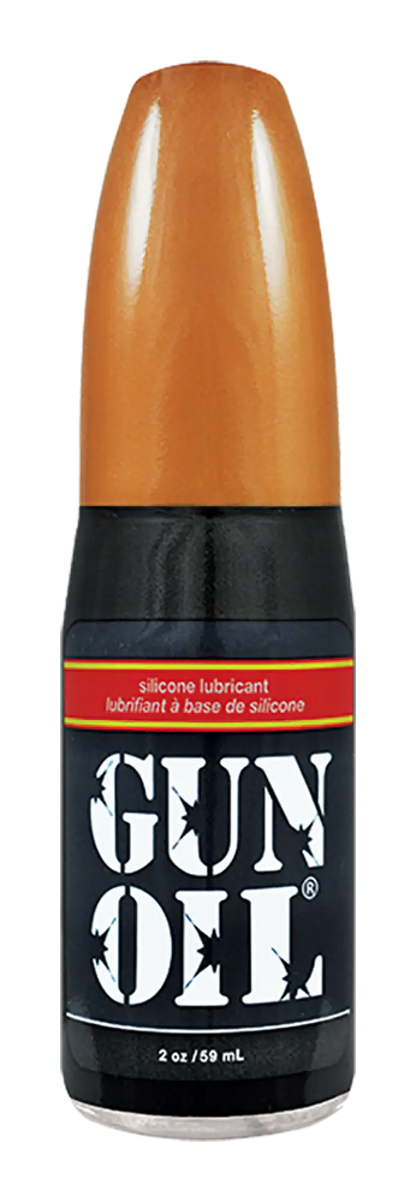 A sleek black bottle of gun oil silicone with a glossy orange cap and bold white label for lubrication use