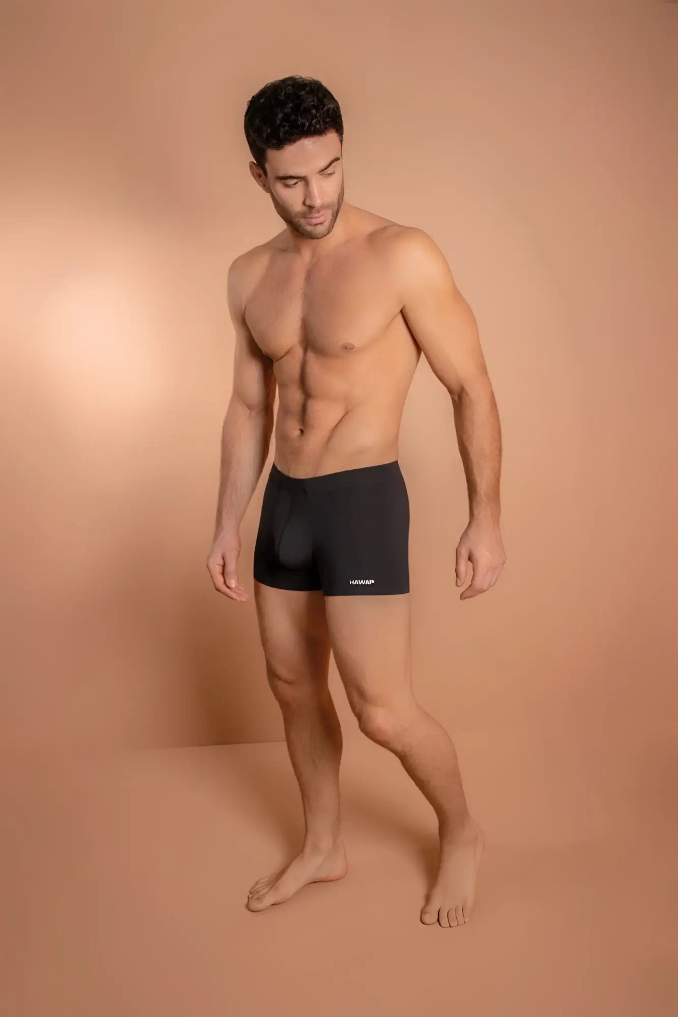 Black men’s microfiber briefs in color black with a subtle logo on the lower left leg hawai 42222 trunks