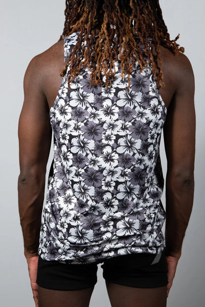 Hawaiian hibiscus print tank top with black and white floral design and fitted sleeveless style