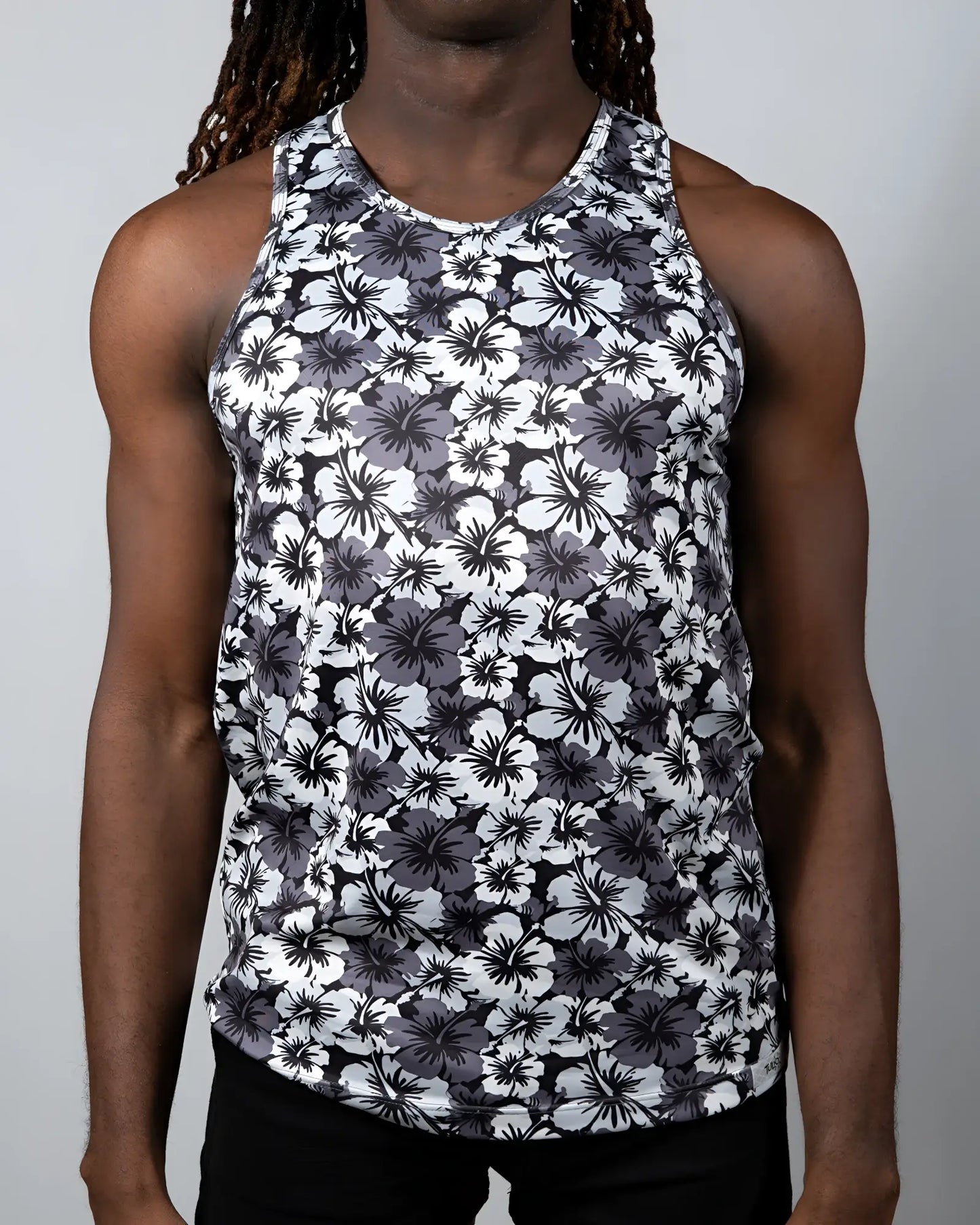 Black and white floral patterned hawaiian hibiscus print tank top with round neckline for casual wear