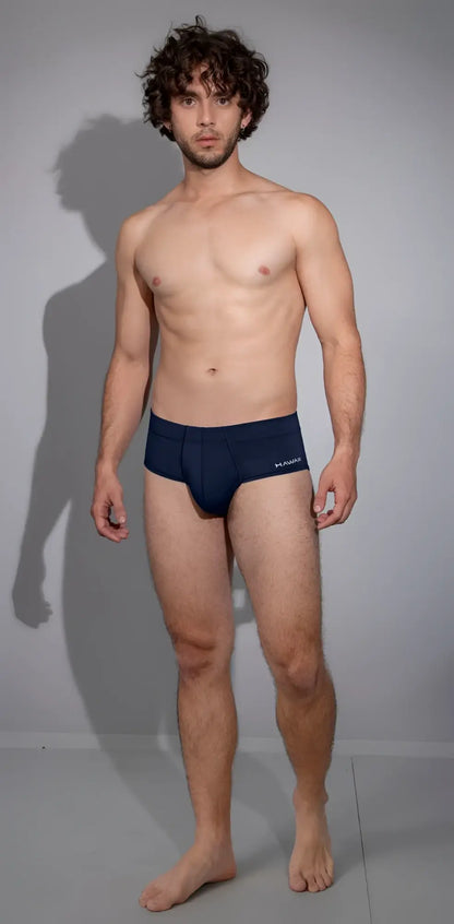 Navy blue hawaï 42241 microfiber men’s briefs with a subtle logo on the waistband front side shown