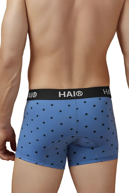 Blue hai boxer briefs in blue quartz cotton blend with black paw print pattern and padded rear section back view