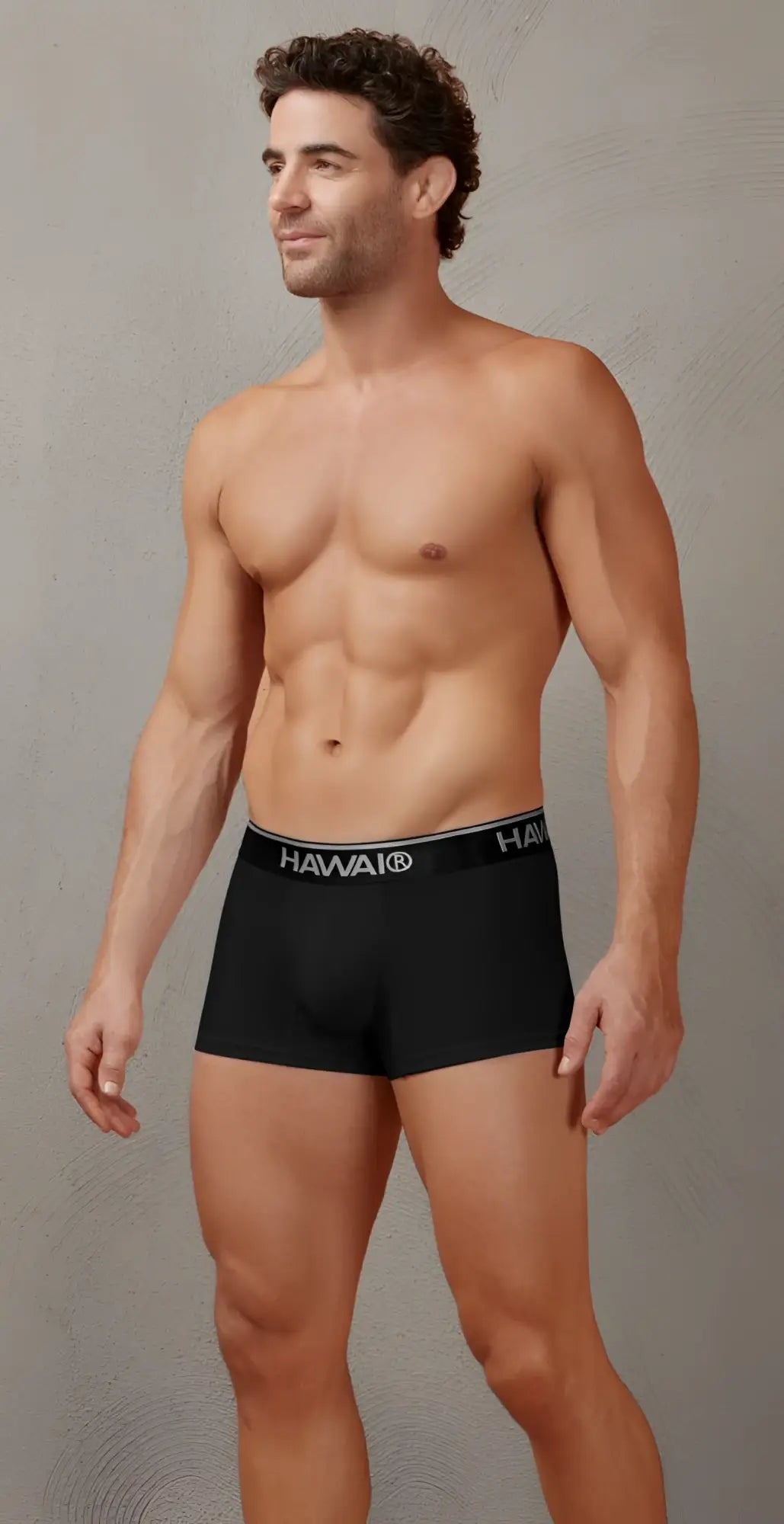 Black men’s cotton blend boxer briefs in black with a white hawaii logo on the waistband front view