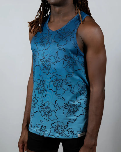 Blue floral patterned tank top with black outlined hibiscus flowers in a hibiscus ombre print tank design