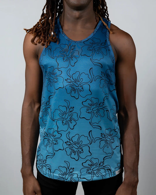Blue floral patterned tank top with black outlined hibiscus flowers in hibiscus ombre print tank design