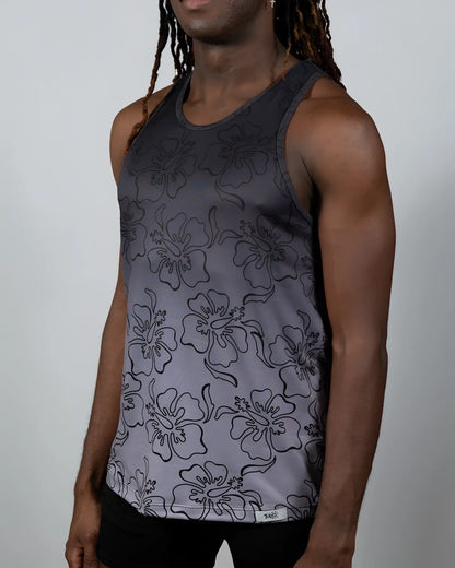 A dark gray hibiscus ombre print tank top with black outlined flowers fading to lighter gray at the bottom