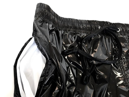 Black glossy nylon high gloss shorts with white inner lining and elastic waistband for comfortable fit