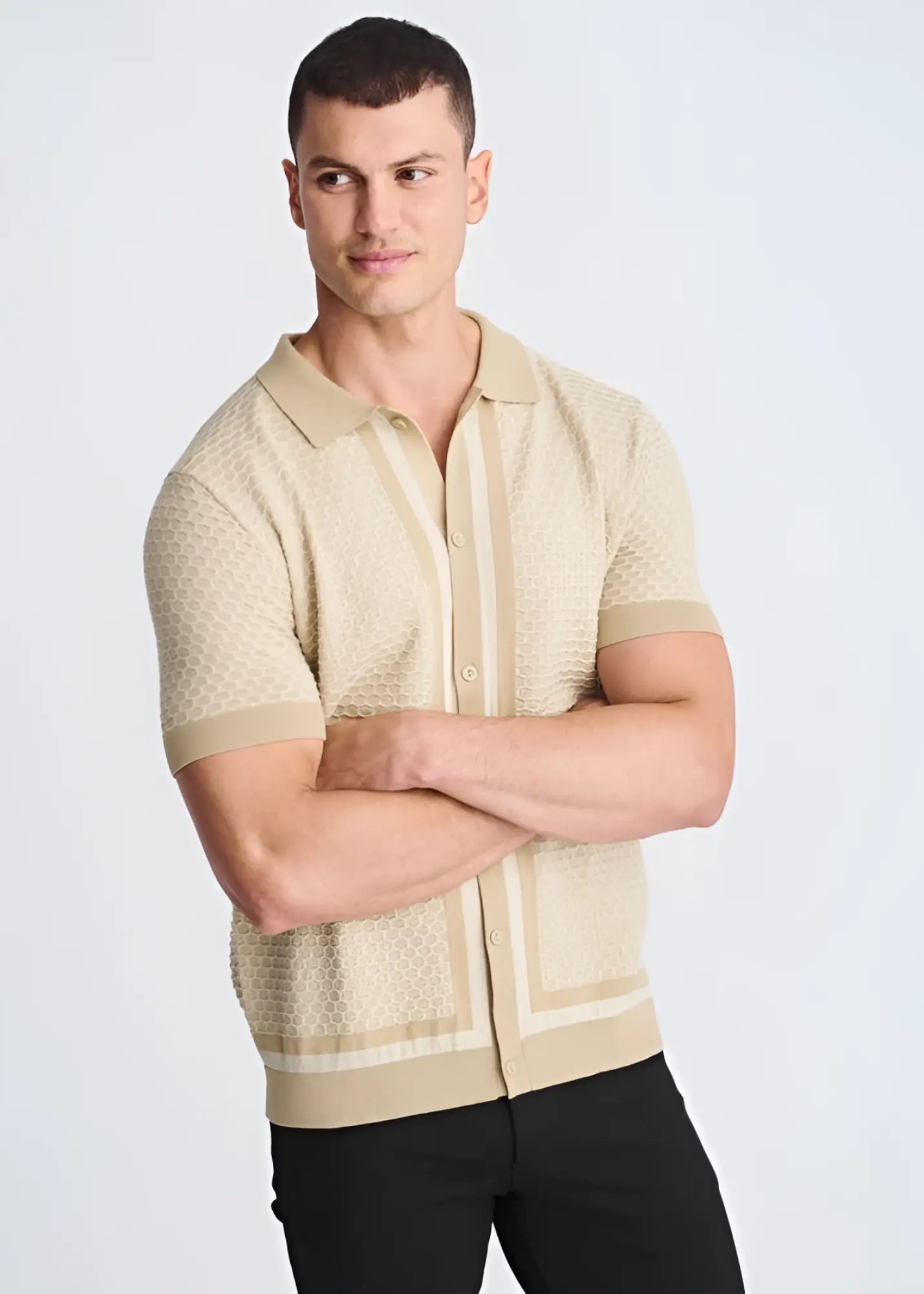 Beige honeycomb textured knit polo shirt with subtle vertical stripes and ribbed cuffs for casual wear