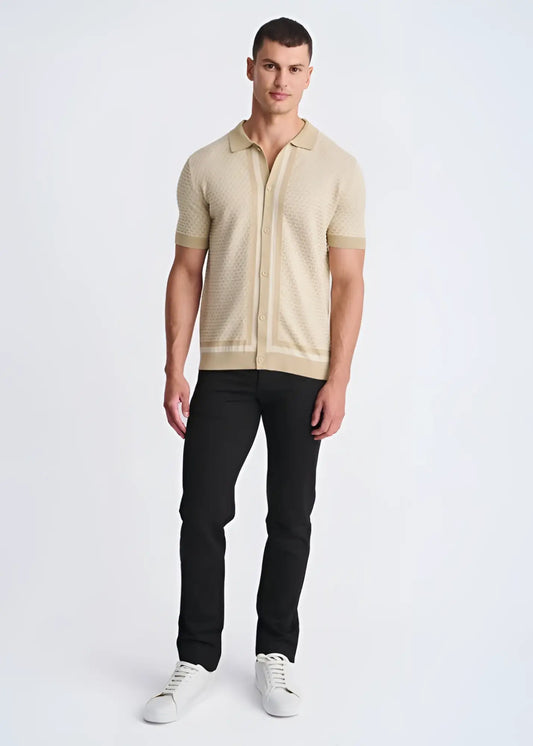 Beige honeycomb textured knit polo shirt with button front and short sleeves made from soft knit material