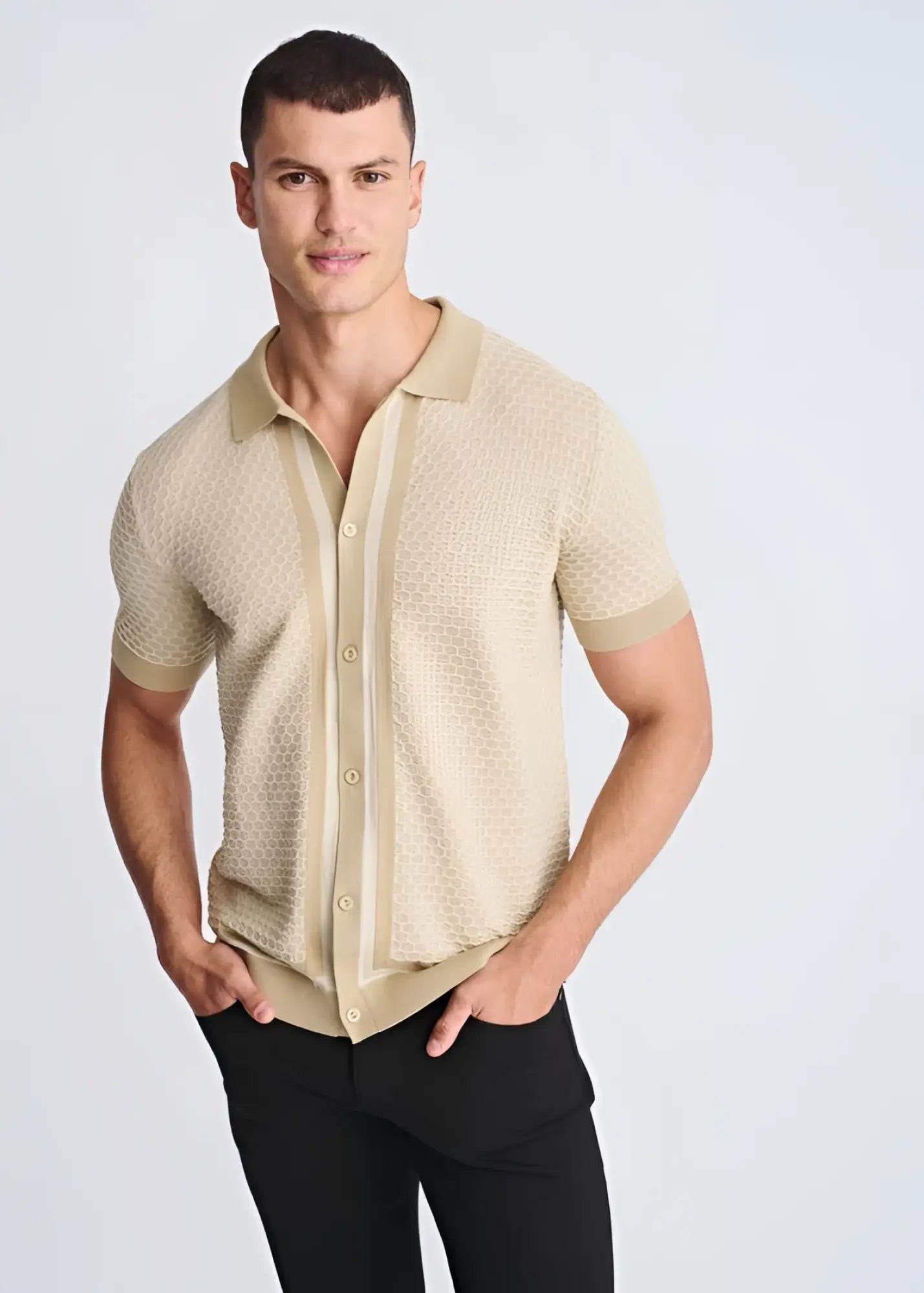 Beige short-sleeved honeycomb textured knit polo shirt with matching collar and button front detail