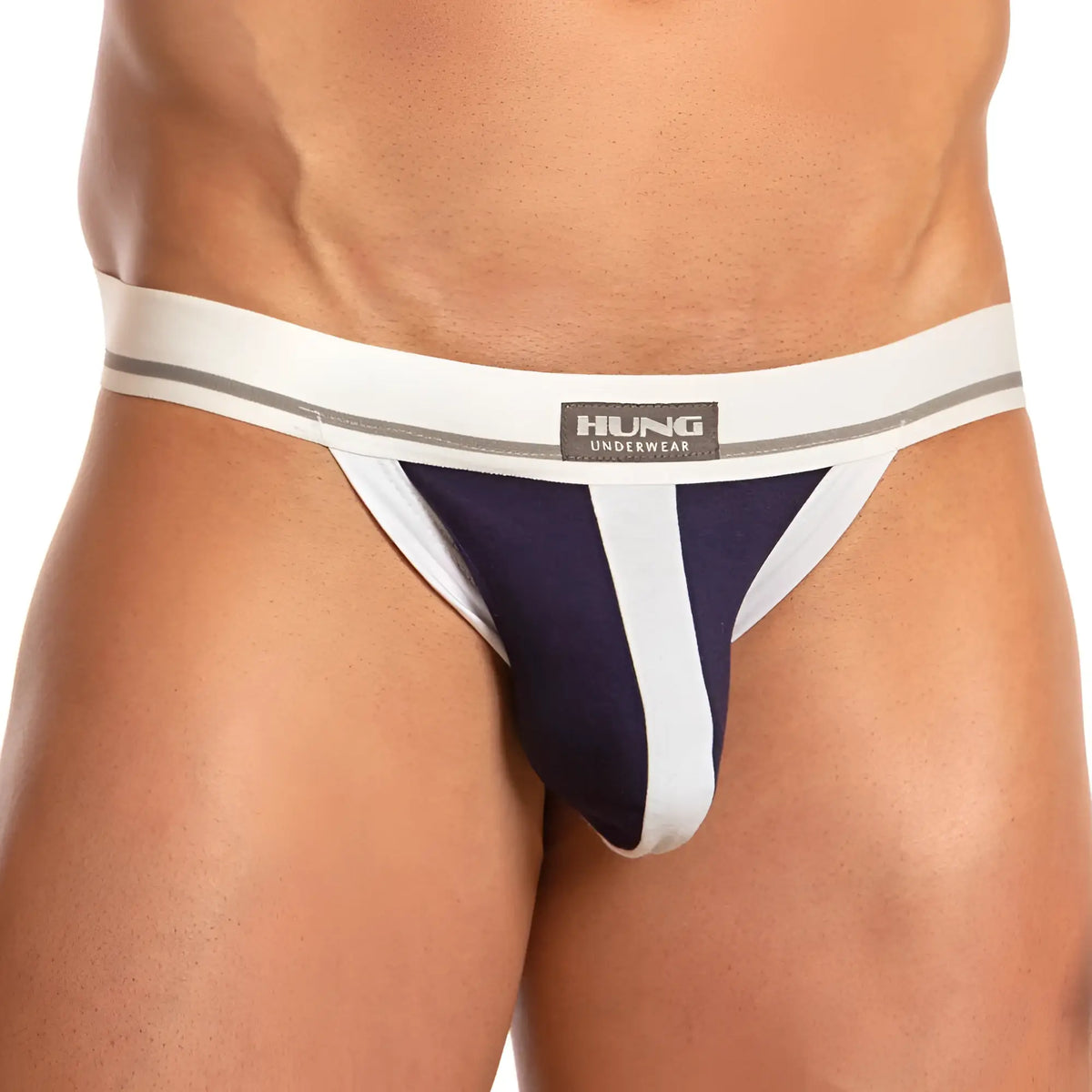 Navy blue and white striped thong with gray accent waistband featuring hung underwear label in hung hge014 jockstrap design