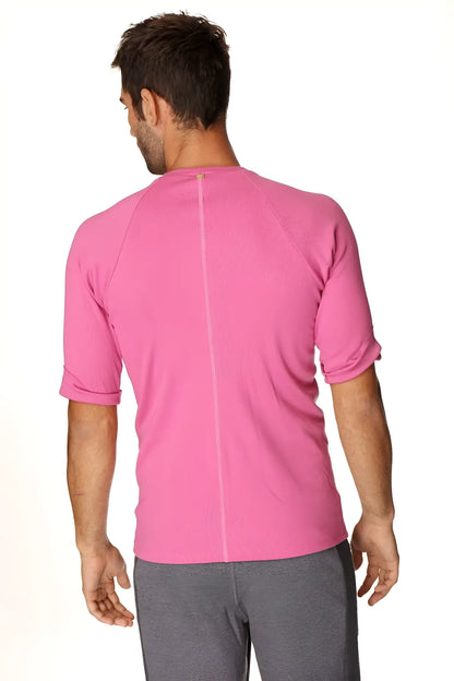 A vibrant pink hybrid crew neck raglan tee with textured fabric and short sleeves for athletic wear