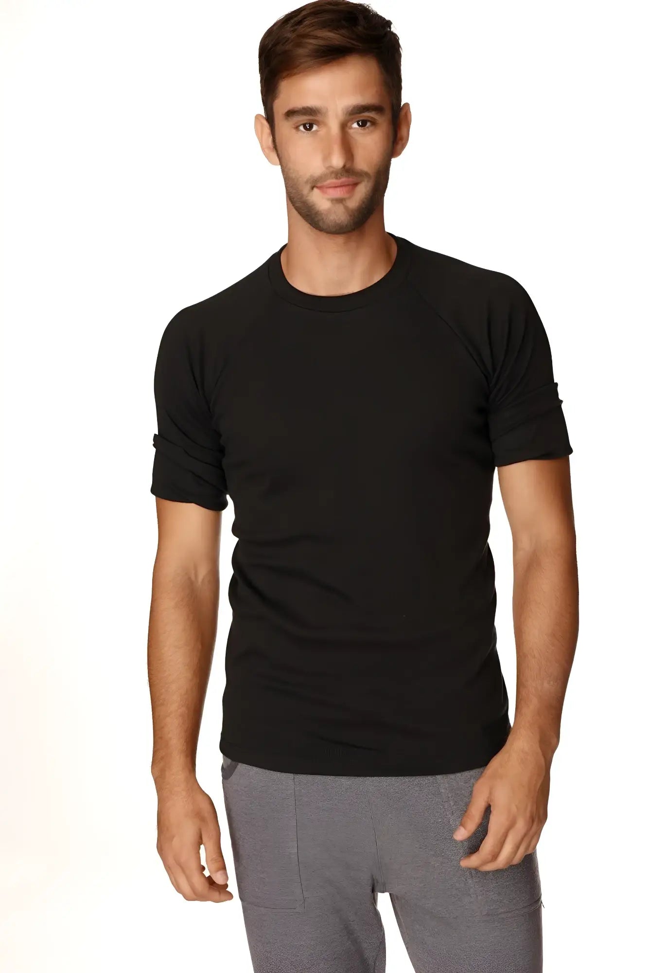 Black short-sleeved hybrid crew neck raglan tee with rolled-up sleeves made of breathable fabric for casual wear