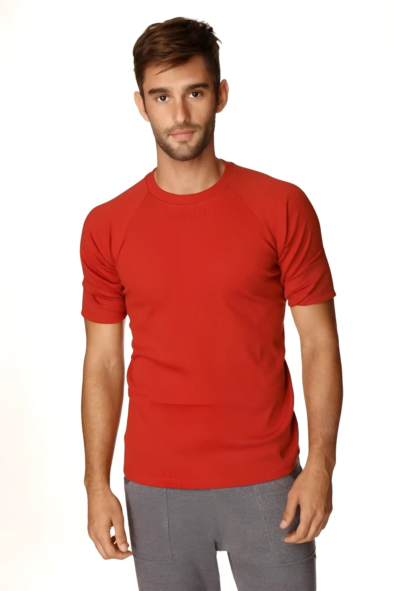 Red short-sleeved hybrid crew neck raglan tee in cinnabar red made from soft breathable fabric