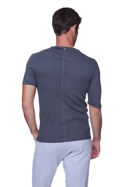 Dark gray textured short-sleeve hybrid v-neck t-shirt with subtle vertical seam on the back in charcoal color