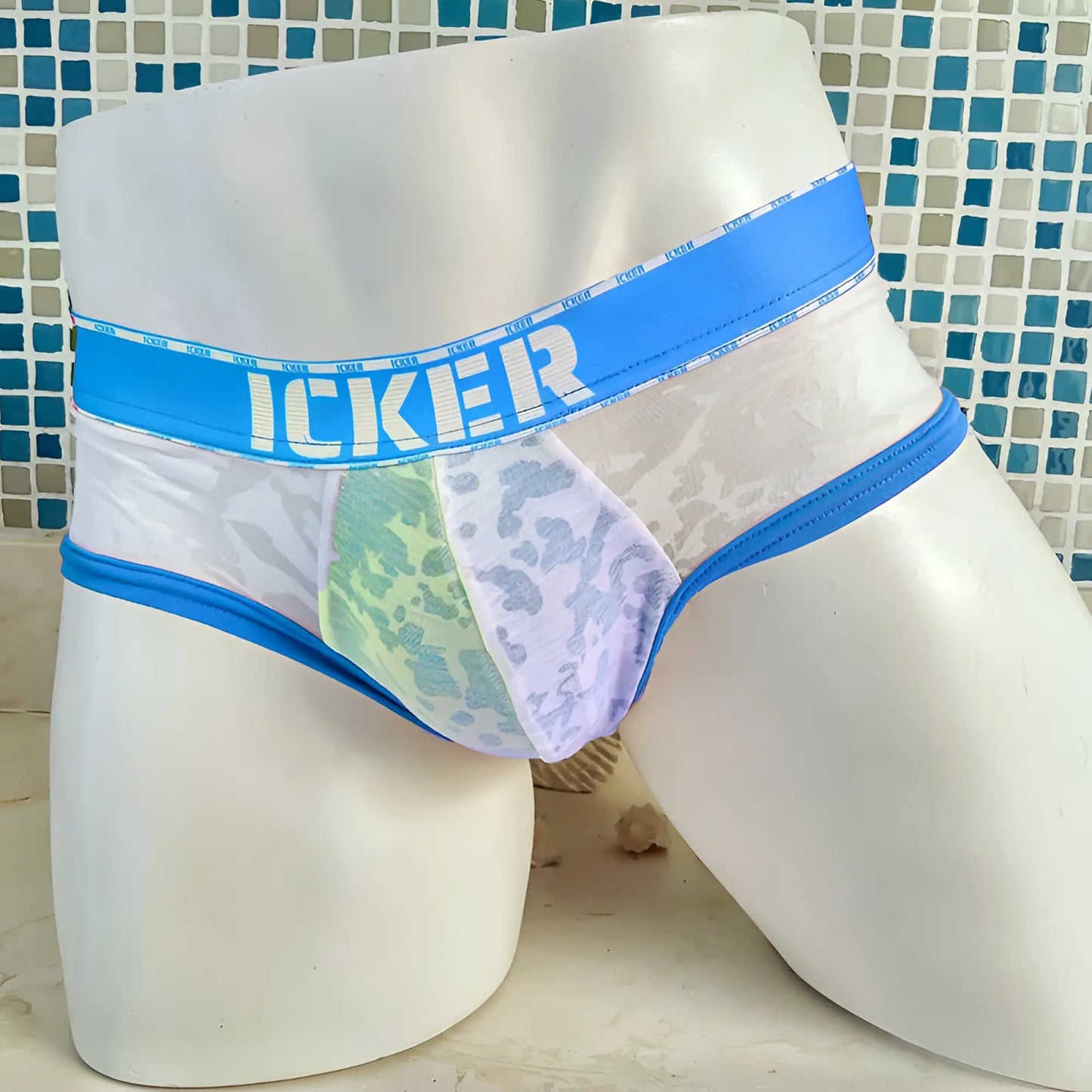 Icker sea acid mesh piping brief underwear in blue with white lace trim and a bold Icker logo on the waistband