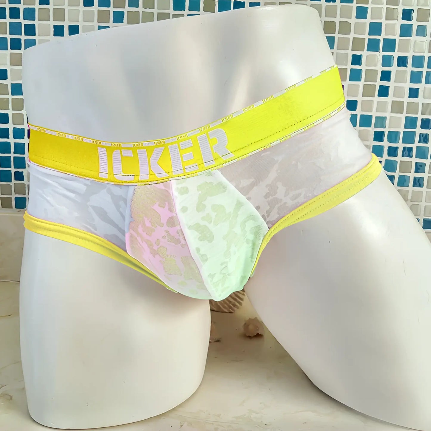 Icker sea acid mesh piping brief underwear in mango with bright yellow waistband and sheer white lace trimmed interior