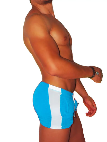 Icker Sea Air Fitness side stripe shorts in blue with white stripes and a drawstring waist for swim and fitness use