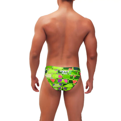 Icker Sea Bricks bikini swimwear green vibrant lime green swim trunks with bold geometric pink purple and teal accents