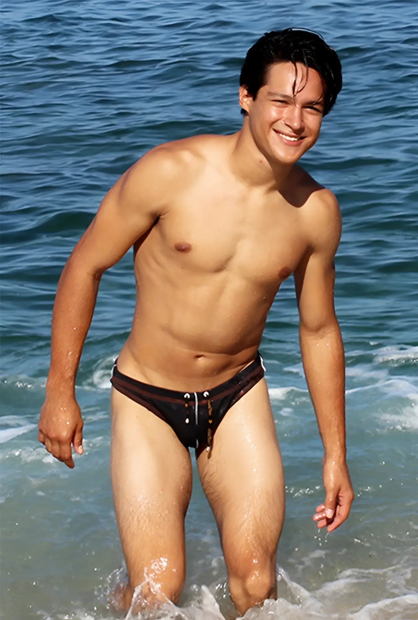 Black icker sea bikini swimwear trunks with white trim and drawstring closure in contrast stitching design