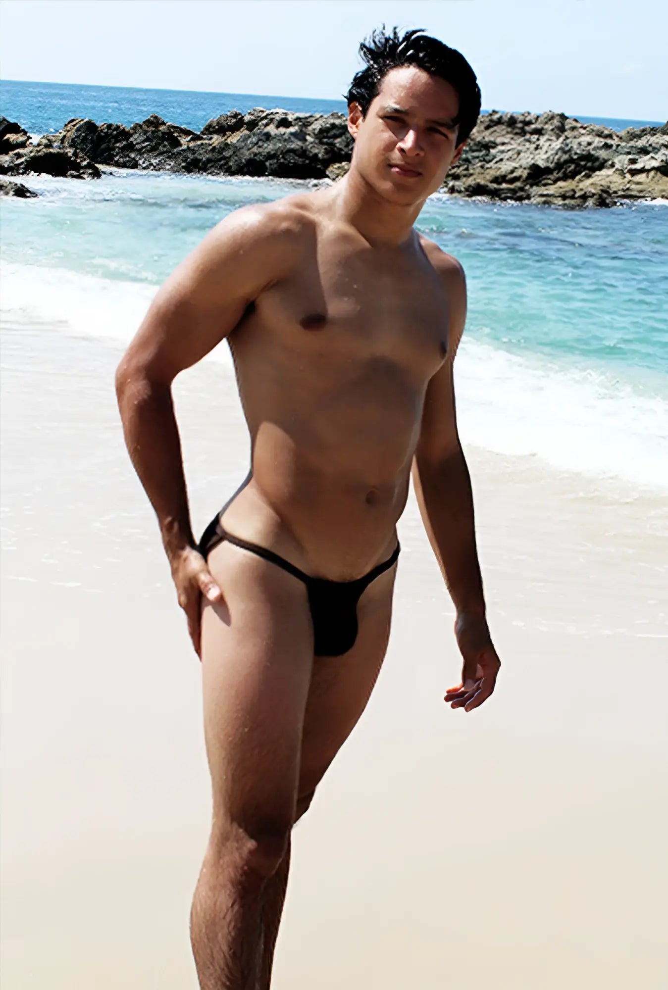 Black thong swimsuit with contrast stitching in black and red from icker sea micro slip tanga bikini swimwear collection