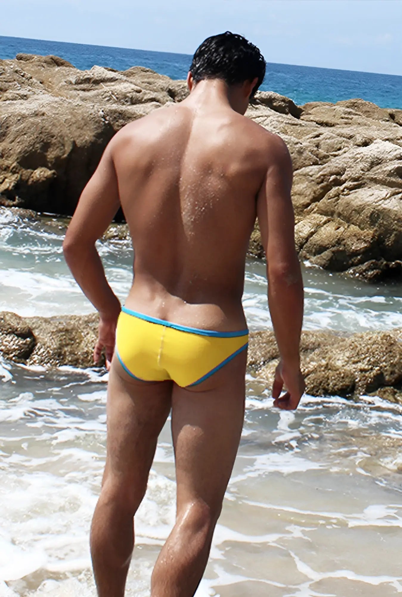 Bright yellow icker sea mini brief bikini swimwear with contrasting blue trim in mango and blue colors