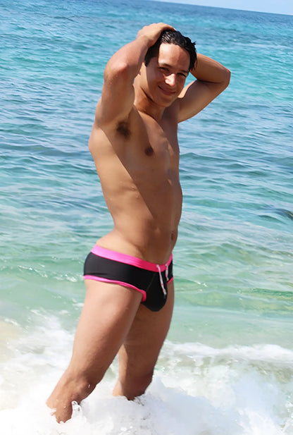 Black swim trunks with vibrant fuchsia trim and white drawstring from icker sea cheeky bikini swimwear cob-15-39