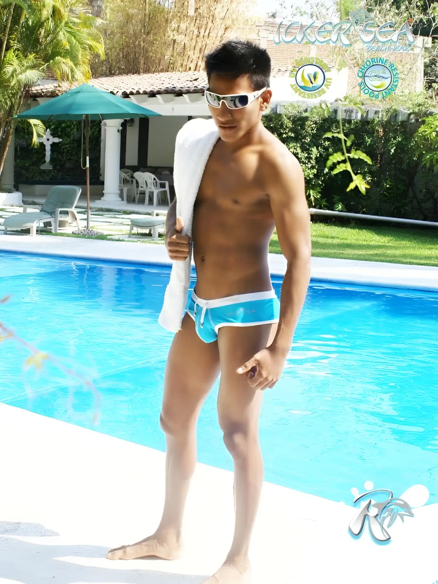 Iker sea blue and white swim trunks with contrast trim and stitching in a sleek modern design for swimwear use
