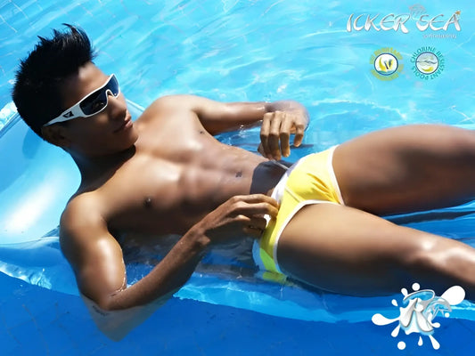 Yellow swim trunks with white contrast trim and stitching from icker sea cheeky mini bikini swimwear mango white cob 13 25