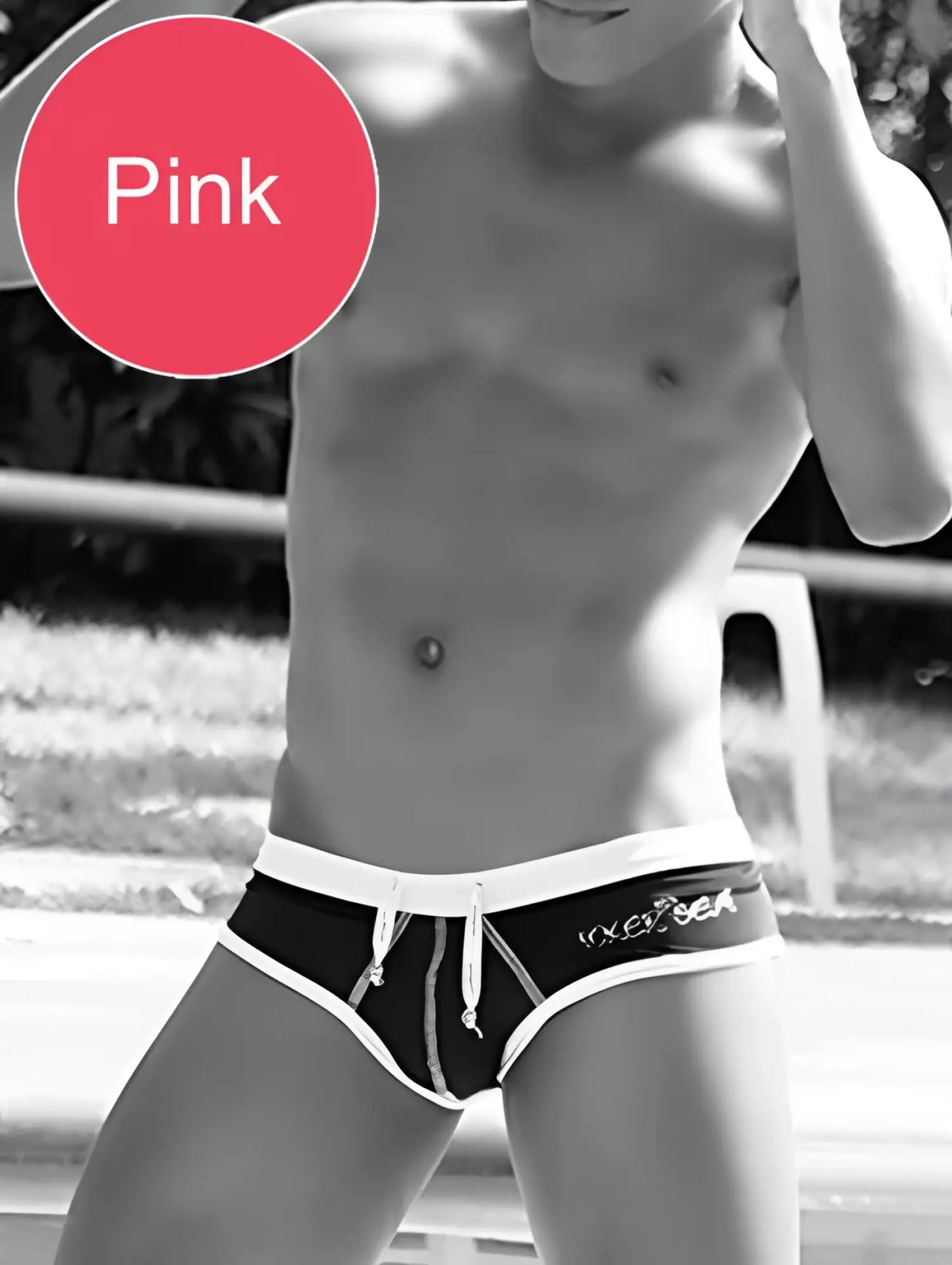 Pink swim trunks with white waistband and drawstring featuring vixen branding from icker sea cheeky mini bikini set