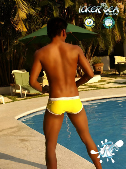 Bright yellow icker sea swim trunks with white contrast trim and stitching for beach and pool use