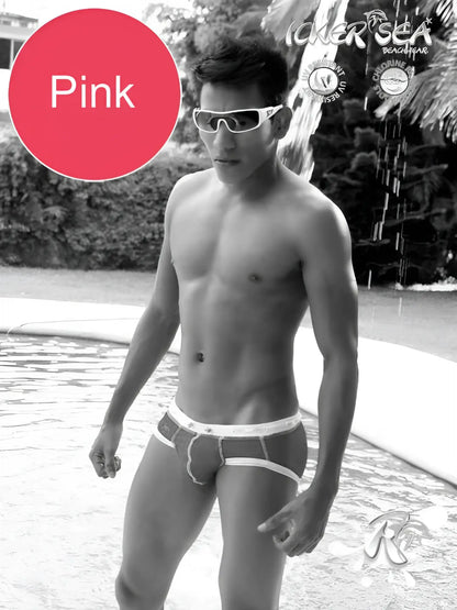 Icker Sea pink swim trunks with white trim and subtle pattern featuring contrast stitching for beachwear