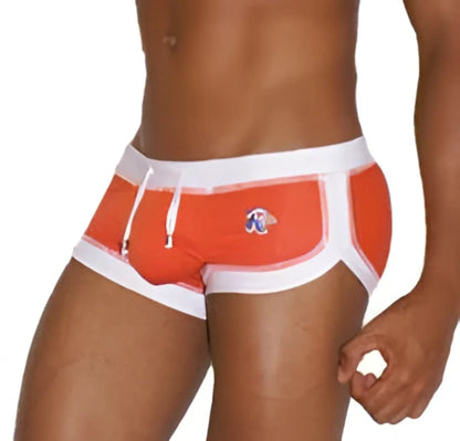 Orange and white Icker Sea curved hemline u shorts square cut trunk swimwear with small logo on left hip
