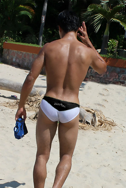 White icker sea duotone bikini swimwear trunks with black waistband designed for comfortable swim use