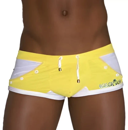 Bright yellow icker sea eyelets square cut trunk swimwear with white gray geometric accents and vicenza logo embroidery