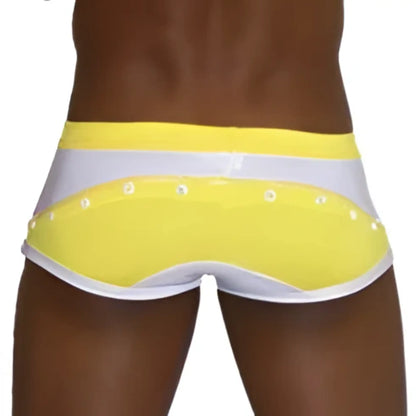 Bright yellow and white icker sea eyelets square cut trunk swimwear with a glossy finish for beach use