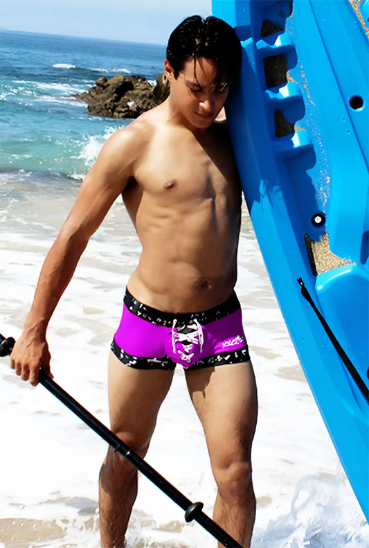 Vibrant purple icker sea lace up contrast square cut swim trunks with black trim and white skull design