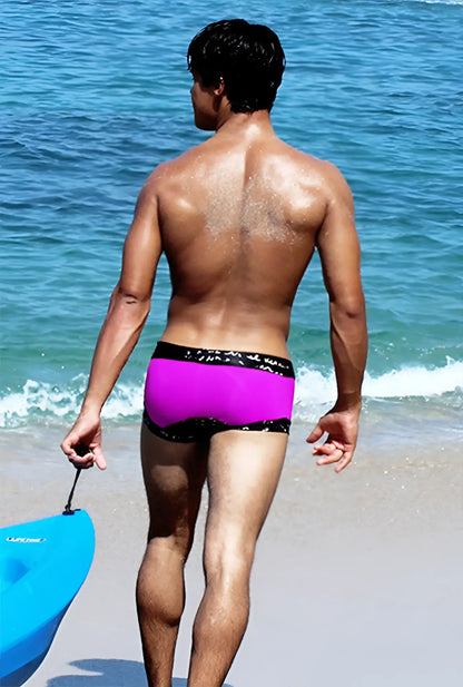 Vibrant magenta icker sea lace up contrast square cut trunk swimwear with black elastic waistband and subtle pattern