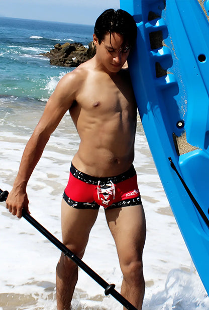 Icker Sea lace up contrast square cut trunk swimwear in red and black with white skull design on the front