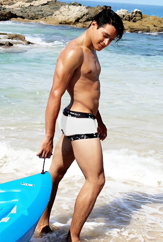 Icker Sea lace up contrast square cut trunk swimwear in white with black patterned trim for swimming and beach use