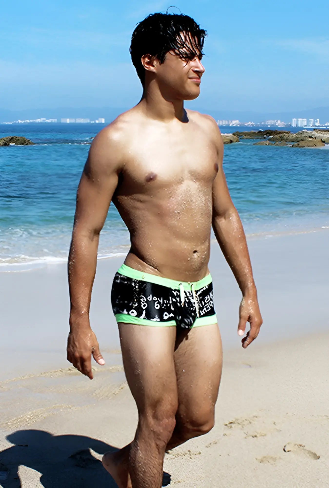 Icker Sea letters square cut trunk swimwear in black and neon green with white graphic pattern for swimming use