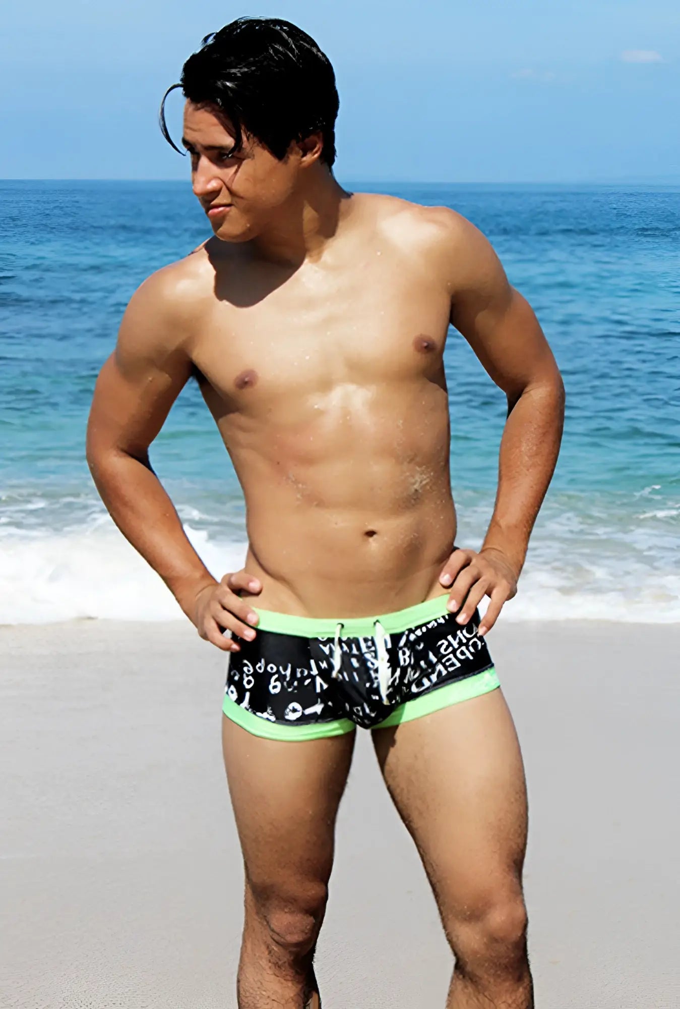 Icker Sea Letters square cut trunk swimwear in black and neon green with white graphic print for swimming