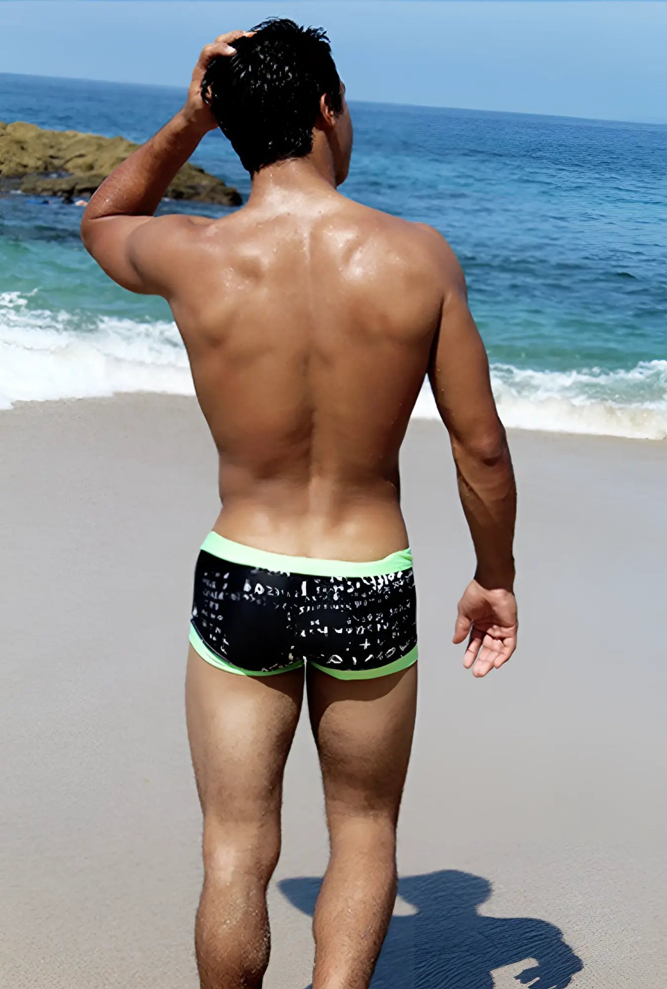 Icker Sea letters square cut trunk swimwear in black with white math equations and bright green trim