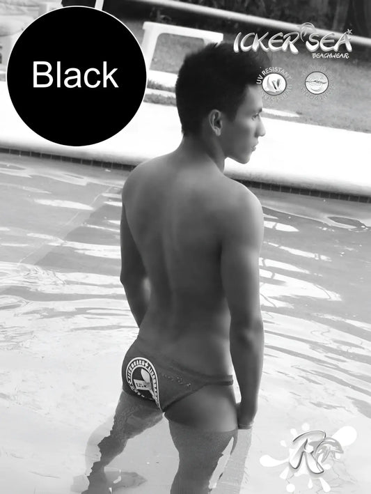 Black icker sea lifeguard micro slip bikini swimwear backside showing white logo on black swim trunks