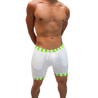 White athletic shorts with bright green and white striped trim at waistband and hem with drawstring closure from icker sea