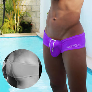 Vibrant purple Laker Sea low-rise scrunched back cheeky square cut swim trunks with a white drawstring.