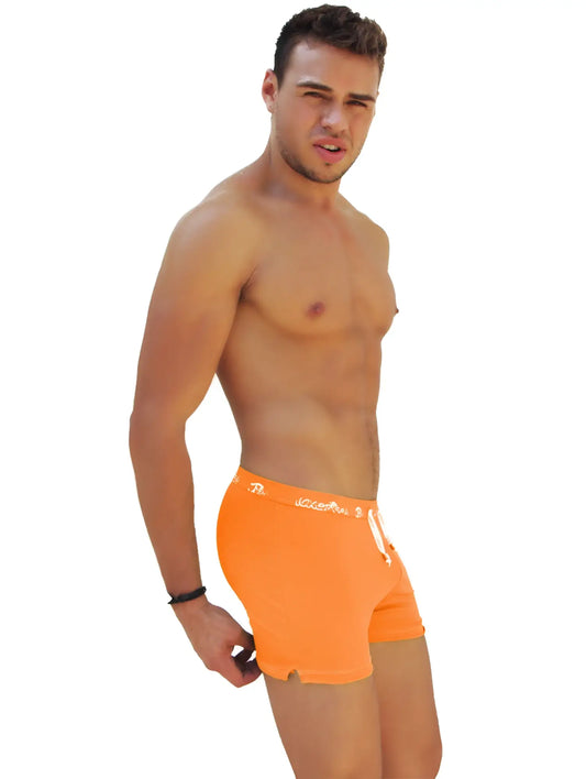Bright orange Icker Sea Side Slit long boxer briefs with white logo and drawstring for comfortable support